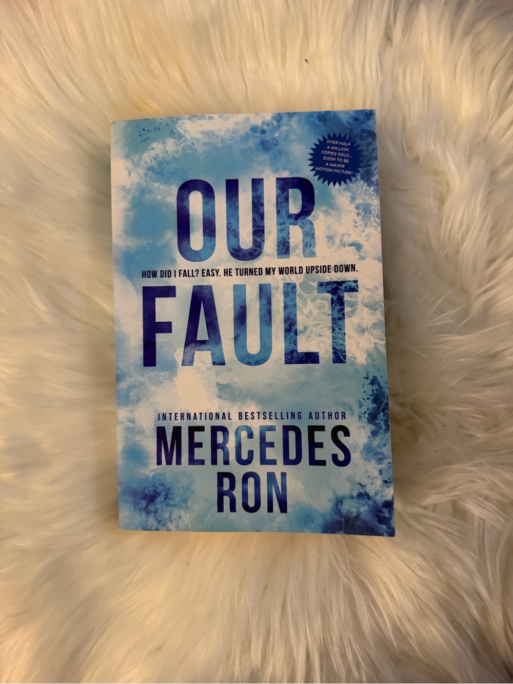 Our Fault by Mercedes Ron - Blue & White Paperback
